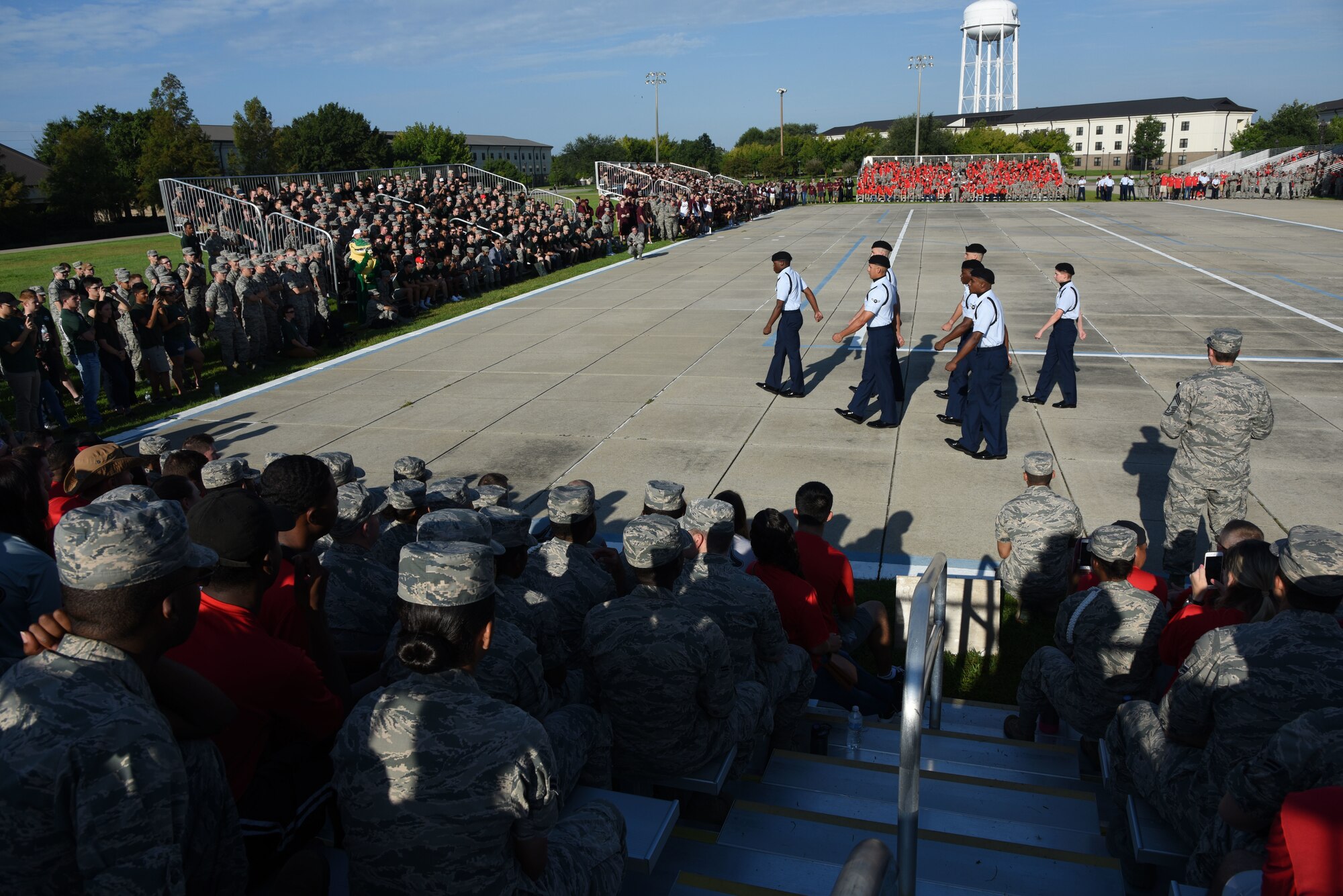 Members of the 335th Training Squadron regulation drill team perform during the 81st Training Group drill down on the Levitow Training Support Facility drill pad at Keesler Air Force Base, Mississippi, Sept. 7, 2018. Airmen from the 81st TRG competed in a quarterly open ranks inspection, regulation drill routine and freestyle drill routine. The 335th TRS "Bulls" took first place in each category this quarter. (U.S. Air Force photo by Kemberly Groue)