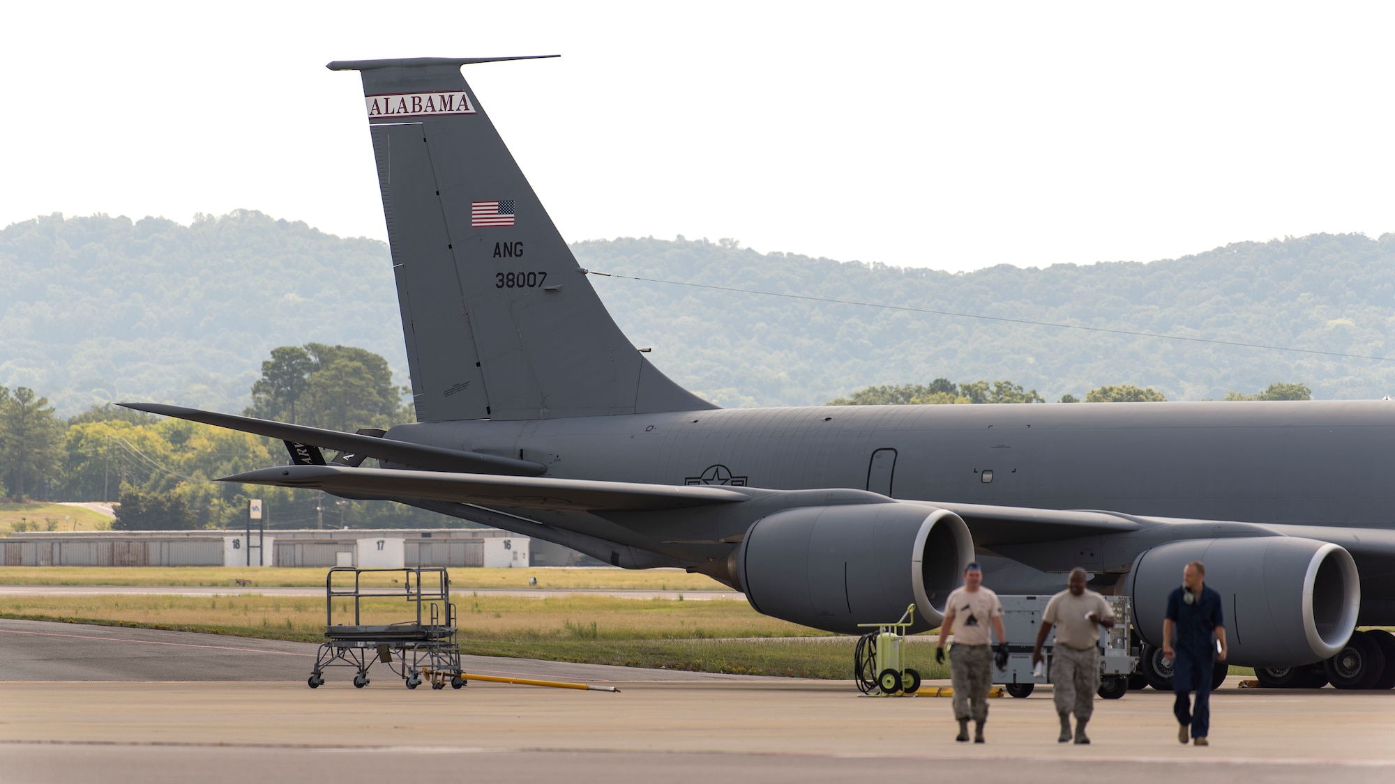 Airmen from the 99th Air Refueling Squadron walk away from a KC-135 Stratontanker aircraft after performing maintenance at Sumpter Smith Air National Guard Base, in Birmingham, Alabama, Aug. 28, 2018. The 99th ARS is a geographically separated unit that functions administratively under MacDill Air Force Base, Fla