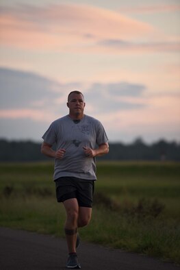 William O’Meara, 14th Civil Engineer Squadron Fire Emergency Services Assistant Fire Chief, runs Aug. 29, 2018, on Columbus Air Force Base, Mississippi. O’Meara is a member of the Air Force Enlisted Village Marathon Team who’s running the marathon for “Mom”.  (U.S. Air Force photo by Airman 1st Class Keith Holcomb)