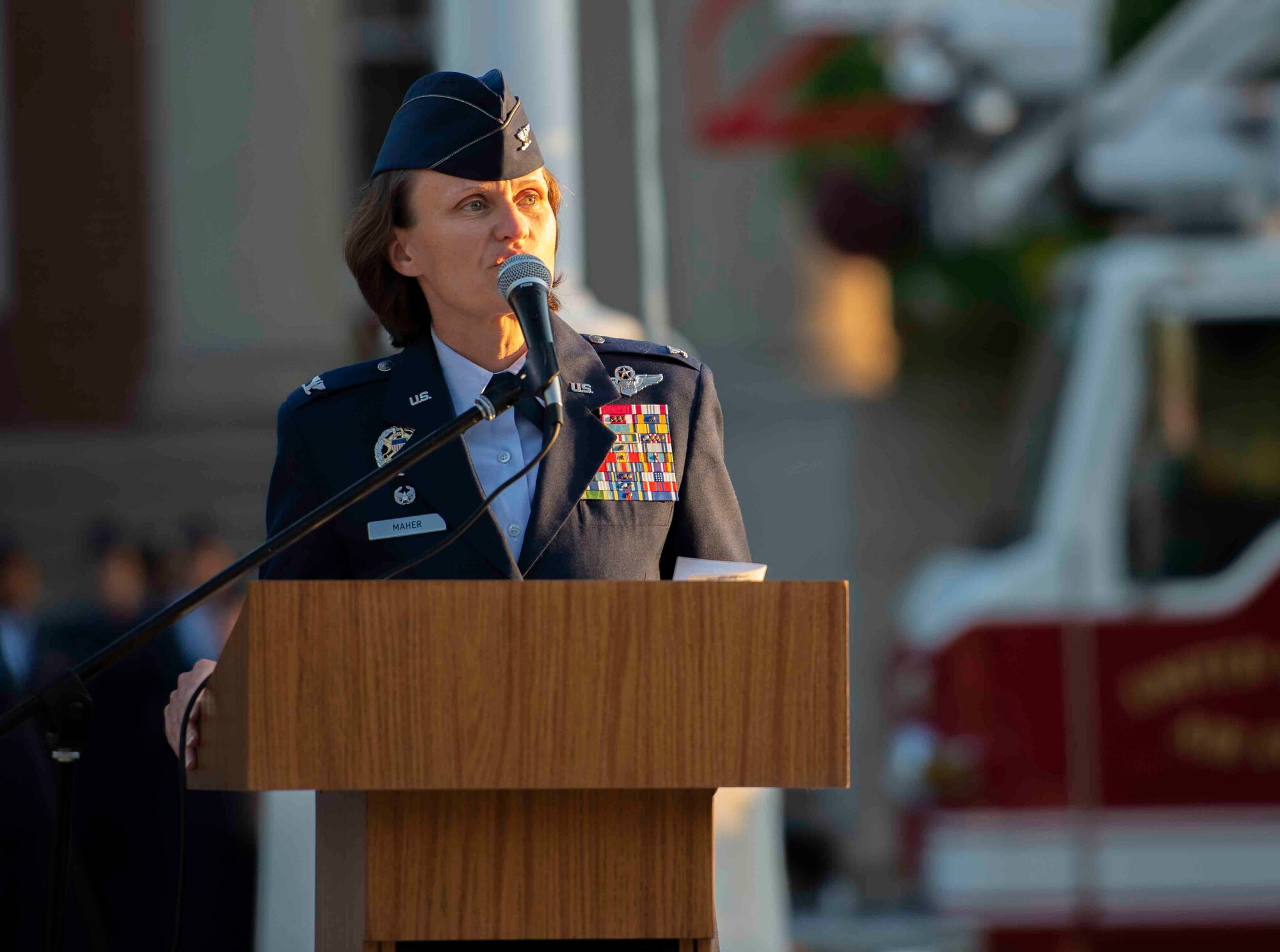 Col. Leslie Maher, 375th Air Mobility Wing commander, spoke during a 9/11 memorial ceremony, Sept. 11, 2018, at Scott Air Force Base, Illinois. Maher was working at the Pentagon at the time of the 2001 terrorist attacks. (U.S. Air Force photo by Airman 1st Class Tara Stetler)