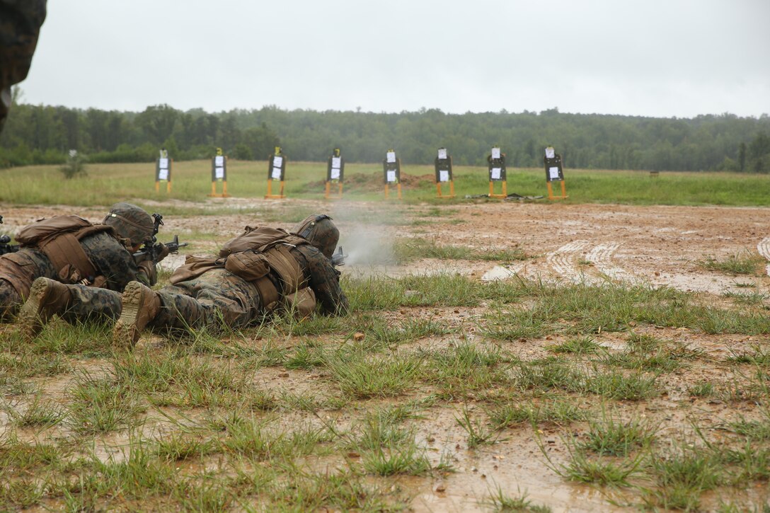 Marines with Marine Barracks Washington D.C. fire rounds down range with their M16A4 service rifles during Fire Team Leaders Course at Marine Corps Base Quantico, Va., Sept. 9, 2018. The course is comprised of multiple live-fire events utilizing numerous weapons systems, patrols and defensive and offensive drills. It is a course designed to strengthen small unit leadership amongst the Marines to prepare them for the Fleet Marine Forces, while focusing on refining their infantry skills. This year marks the fourth iteration of the Fire Team Leaders Course.