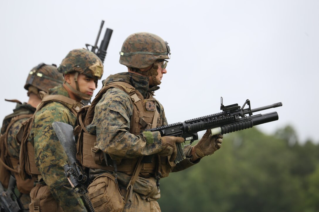 A Marine with Marine Barracks Washington D.C. loads a round into an M203 Grenade Launcher during a live fire exercise at Marine Corps Base Quantico, Va., Sept. 9, 2018. The course was comprised of multiple live-fire events utilizing numerous weapons systems, patrols and defensive and offensive drills. It is a course designed to strengthen small unit leadership amongst the Marines to prepare them for the Fleet Marine Forces, while focusing on refining their infantry skills. This year marks the fourth iteration of the Fire Team Leaders Course.