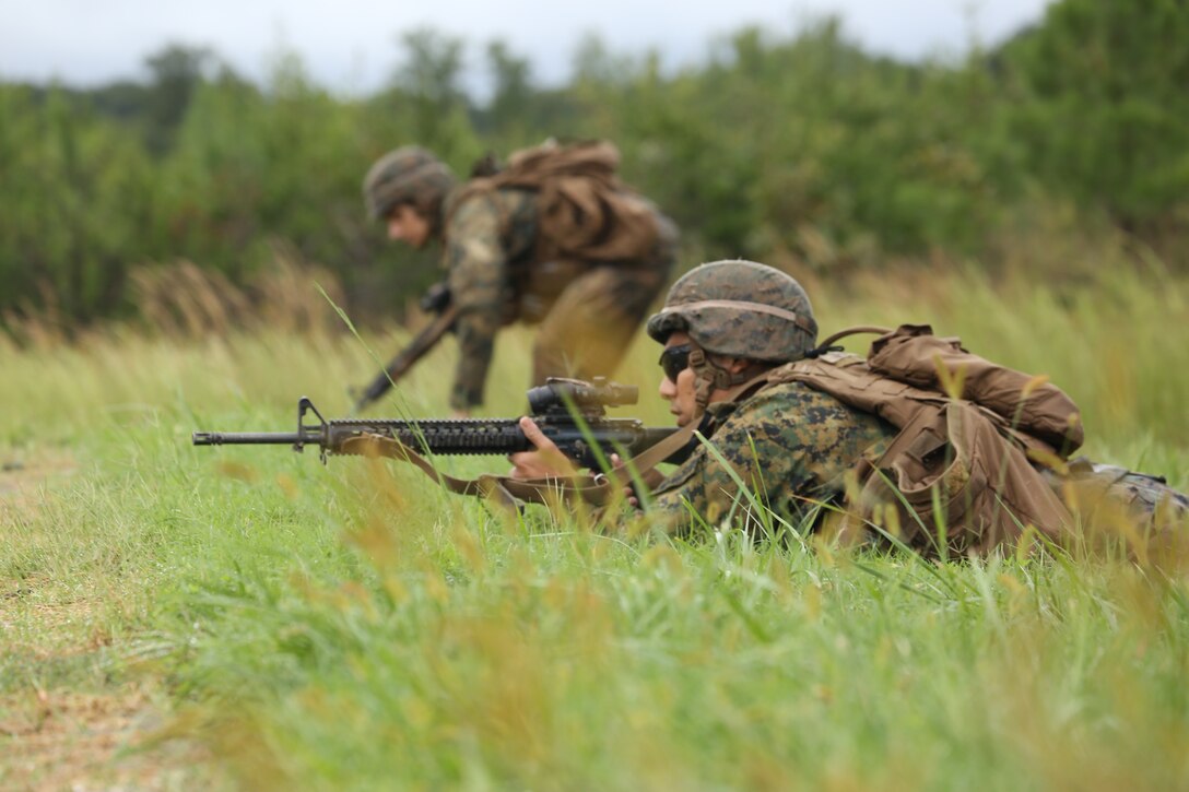 Marines with Marine Barracks Washington D.C. conduct buddy rush drills during a live-fire training exercise for the Fire Team Leaders Course at Marine Corps Base Quantico, Va., Sept. 9, 2018. The course was comprised of multiple live-fire events utilizing numerous weapons systems, patrols and defensive and offensive drills. It is a course designed to strengthen small unit leadership amongst the Marines to prepare them for the Fleet Marine Forces, while focusing on refining their infantry skills. This year marks the fourth iteration of the Fire Team Leaders Course.