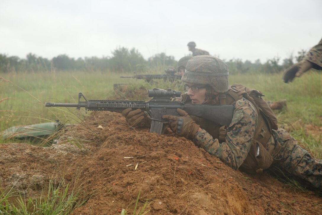 Marines from Marine Barracks Washington D.C. conduct a buddy rushing drill during a live-fire training exercise for the Fire Team Leaders Course at Marine Corps Base Quantico, Va., Sept. 10, 2018. The course was comprised of multiple live-fire events utilizing numerous weapons systems, patrols and defensive and offensive drills. It is a course designed to strengthen small unit leadership amongst the Marines to prepare them for the Fleet Marine Forces, while focusing on refining their infantry skills.