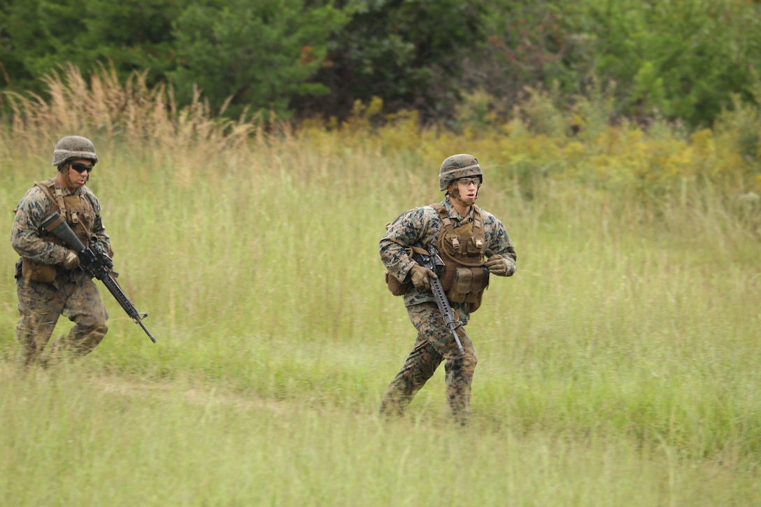 Marines from Marine Barracks Washington D.C. make a movement to contact during a live-fire training exercise for the Fire Team Leaders Course at Marine Corps Base Quantico, Va., Sept. 10, 2018. The course was comprised of multiple live-fire events utilizing numerous weapons systems, patrols and defensive and offensive drills. It is a course designed to strengthen small unit leadership amongst the Marines to prepare them for the Fleet Marine Forces, while focusing on refining their infantry skills.