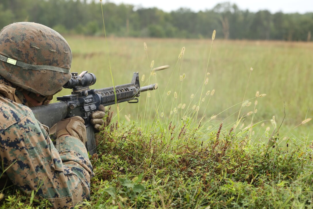 A Marine with Marine Barracks Washington D.C. fires rounds from an M16A4 during a live-fire training exercise for the Fire Team Leaders Course at Marine Corps Base Quantico, Va., Sept. 10, 2018. The course was comprised of multiple live-fire events utilizing numerous weapons systems, patrols and defensive and offensive drills. It is a course designed to strengthen small unit leadership amongst the Marines to prepare them for the Fleet Marine Forces, while focusing on refining their infantry skills.