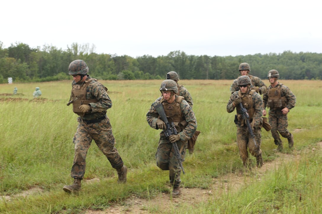 Marines from Marine Barracks Washington D.C. conduct a movement off the range following a live-fire training exercise for the Fire Team Leaders Course at Marine Corps Base Quantico, Va., Sept. 10, 2018. The course was comprised of multiple live-fire events utilizing numerous weapons systems, patrols and defensive and offensive drills. It is a course designed to strengthen small unit leadership amongst the Marines to prepare them for the Fleet Marine Forces, while focusing on refining their infantry skills.