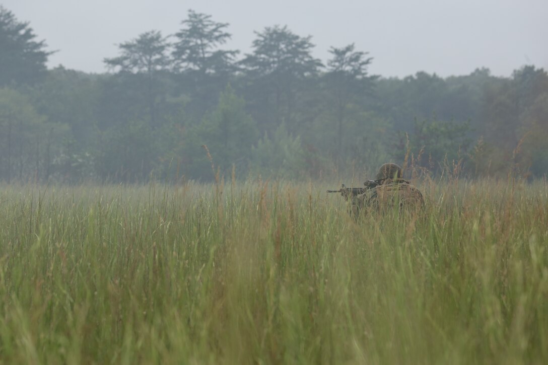 A Marine with Marine Barracks Washington D.C. aims at a target during a live-fire training exercise for the Fire Team Leaders Course at Marine Corps Base Quantico, Va., Sept. 10, 2018. The course was comprised of multiple live-fire events utilizing numerous weapons systems, patrols and defensive and offensive drills. It is a course designed to strengthen small unit leadership amongst the Marines to prepare them for the Fleet Marine Forces, while focusing on refining their infantry skills.