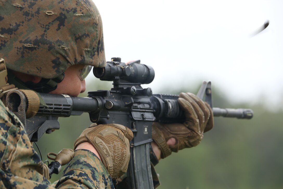 A Marine with Marine Barracks Washington D.C. fires a round from an M16A4 during a live-fire training exercise for the Fire Team Leaders Course at Marine Corps Base Quantico, Va., Sept. 10, 2018. The course was comprised of multiple live-fire events utilizing numerous weapons systems, patrols and defensive and offensive drills. It is a course designed to strengthen small unit leadership amongst the Marines to prepare them for the Fleet Marine Forces, while focusing on refining their infantry skills.
