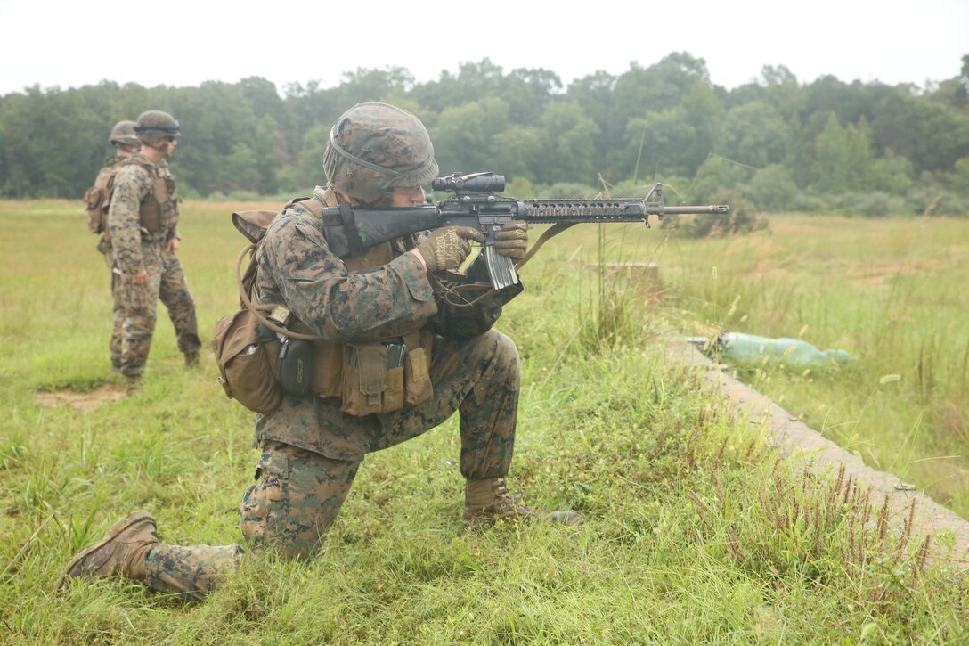 A Marine from Marine Barracks Washington D.C. aims at a target during a live-fire training exercise for the Fire Team Leaders Course at Marine Corps Base Quantico, Va., Sept. 10, 2018. The course was comprised of multiple live-fire events utilizing numerous weapons systems, patrols and defensive and offensive drills. It is a course designed to strengthen small unit leadership amongst the Marines to prepare them for the Fleet Marine Forces, while focusing on refining their infantry skills.