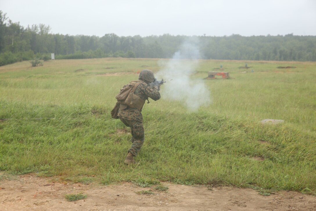 A Marine with Marine Barracks Washington D.C. fires a round from an M16A4 during a live-fire training exercise for the Fire Team Leaders Course at Marine Corps Base Quantico, Va., Sept. 10, 2018. The course was comprised of multiple live-fire events utilizing numerous weapons systems, patrols and defensive and offensive drills. It is a course designed to strengthen small unit leadership amongst the Marines to prepare them for the Fleet Marine Forces, while focusing on refining their infantry skills.