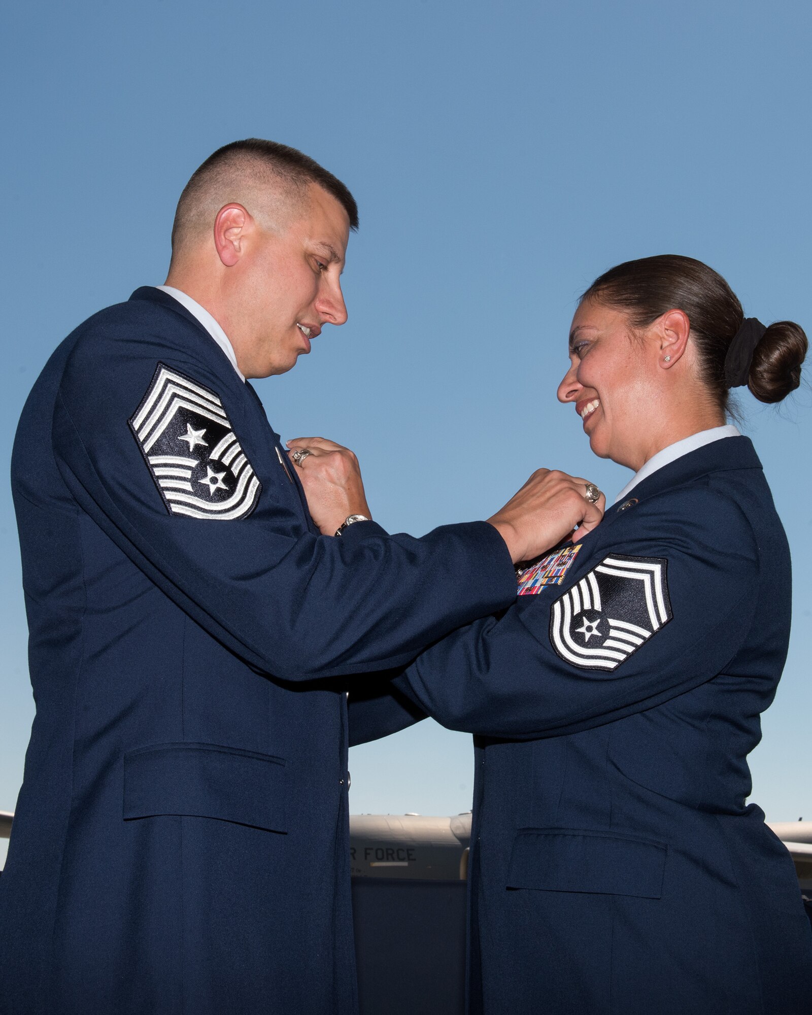 U.S. Air Force Chief Master Sgt. Steve Nichols, 60th Air Mobility Wing command chief and his spouse Senior Master Sgt. Angell Nichols, 60th Operations Support Squadron retire together in a duel ceremony at Travis Air Force Base, Calif., September 7, 2018. (U.S. Air Force photo by Louis Briscese)