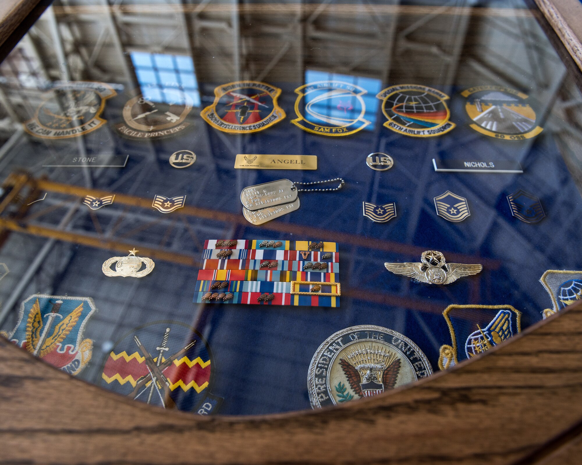 U.S. Air Force Chief Master Sgt. Steve Nichols, 60th Air Mobility Wing command chief and his spouse Senior Master Sgt. Angell Nichols, 60th Operations Support Squadron retire together in a duel ceremony at Travis Air Force Base, Calif., September 7, 2018. (U.S. Air Force photo by Louis Briscese)