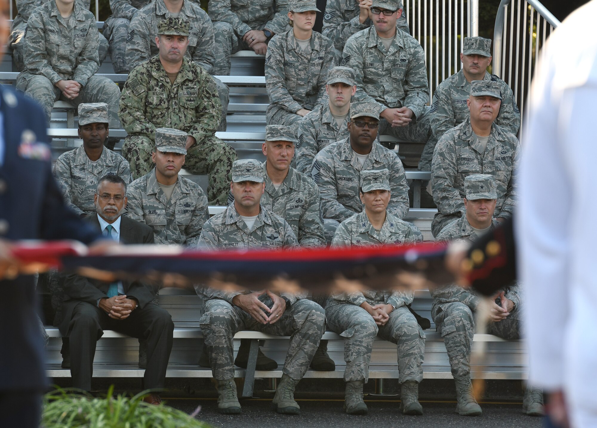 Keesler leadership attend a 9/11 memorial ceremony in front of the 81st Training Wing headquarters building at Keesler Air Force Base, Mississippi, Sept. 11, 2018. The event, attended by Keesler Airmen, Sailors, Marines and civilians, honored those who lost their lives during the 9/11 attacks. (U.S. Air Force photo by Kemberly Groue)
