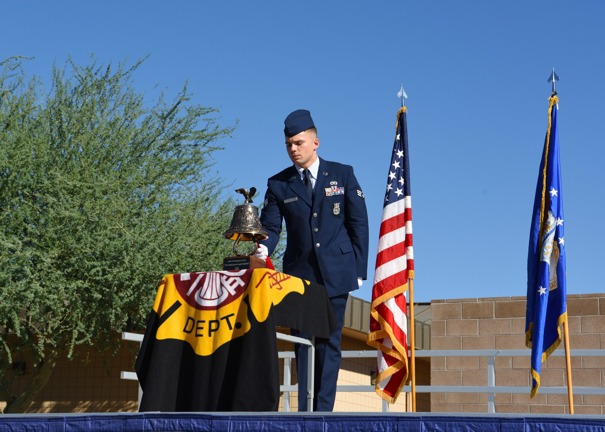 Senior Airman Craig Deacon, 56th Civil Engineer Squadron firefighter, conducted the Last Alarm with the ringing of the bell Sept. 11, 2018 at Luke Air Force Base, Ariz. The Last Alarm symbolizes the devotion and sacrifice of the fallen heroes and first responders on Sept. 11, 2001. (U.S. Air Force photo by Airman 1st Class Aspen Reid)
