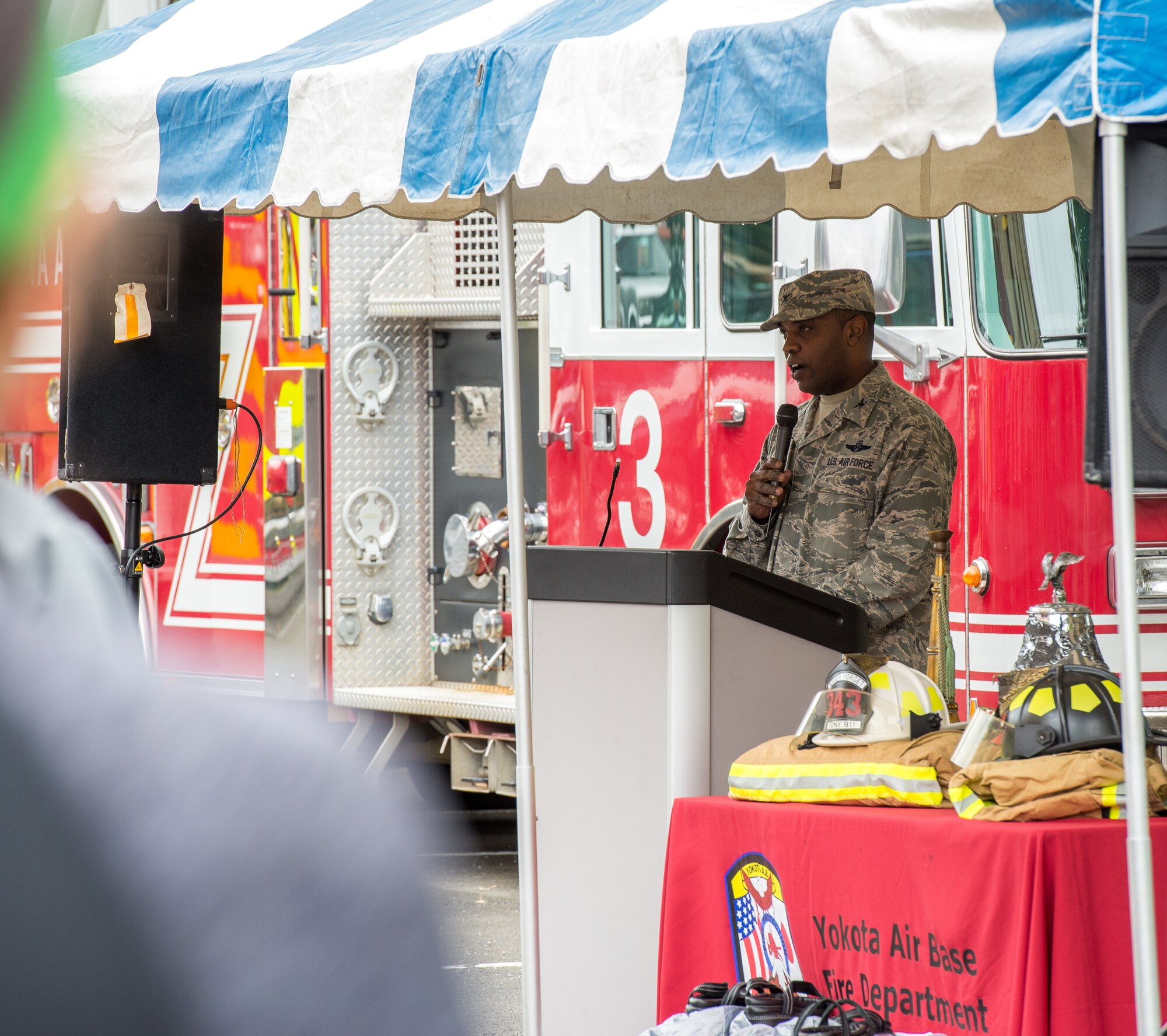Col. Otis T. Jones, 374th Airlift Wing commander, speaks at the opening ceremony