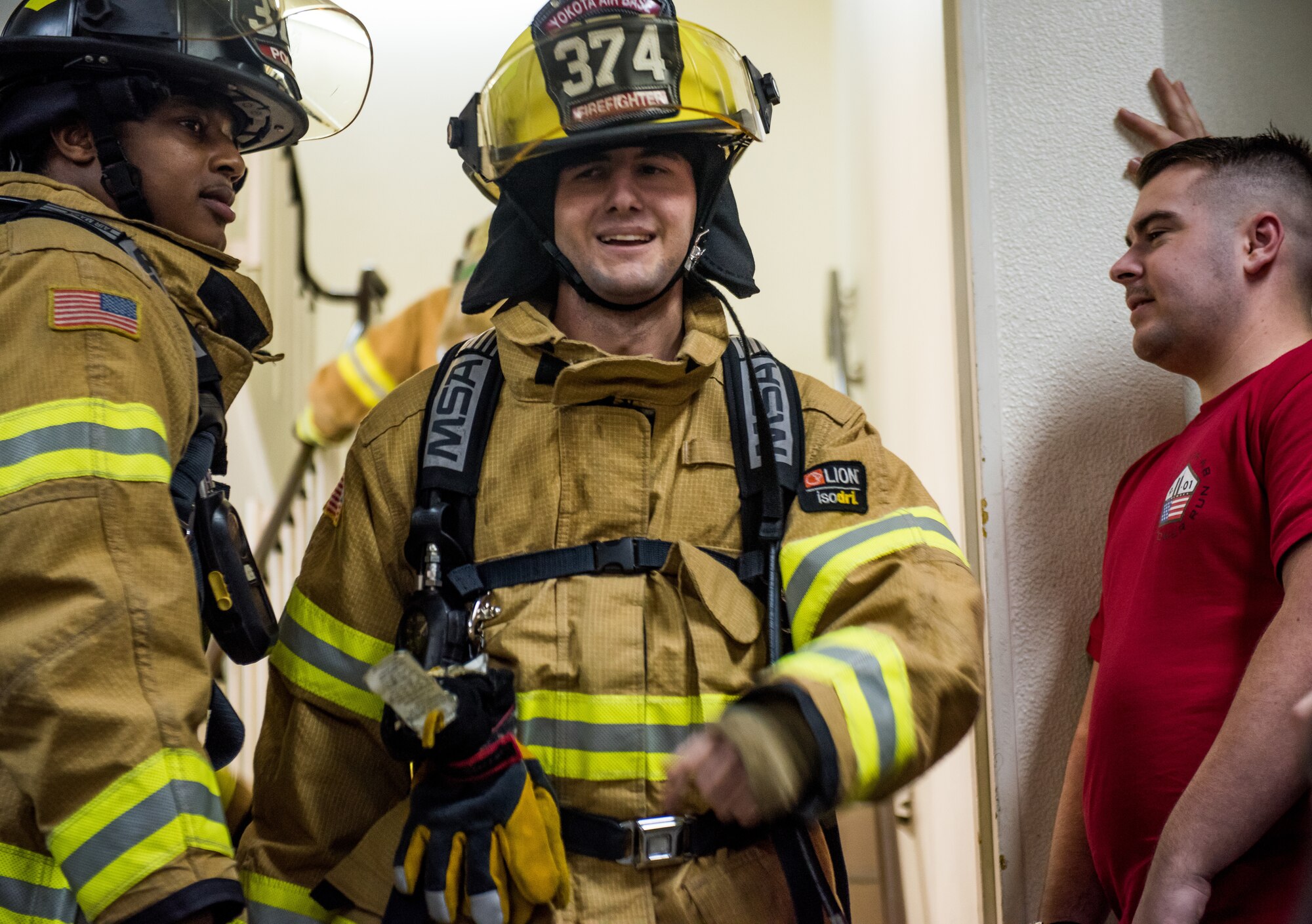 374th Civil Engineering Squadron firefighters participate in the sixth annual Yokota Fire Emergency Services 9/11 Tower Run