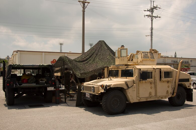 MARINE CORPS AIR STATION FUTENMA, OKINAWA, Japan – An evacuation control center tent is set up during a noncombatant evacuation operations training exercise Aug. 7 at the Marine Corps Air Station Futenma terminal in Okinawa, Japan.