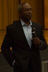 Retired Lt. Gen. Ronald Bailey Jr. stands before an audience of Marines and sailors Sept. 6, 2018, during a Persevering Though Trials special event at the Camp Foster theater, Okinawa, Japan.