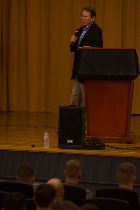 Phil Downer speaks to Marines and sailors Sept. 6, 2018, during a Persevering Though Trials special event at the Camp Foster Theater, Okinawa, Japan.