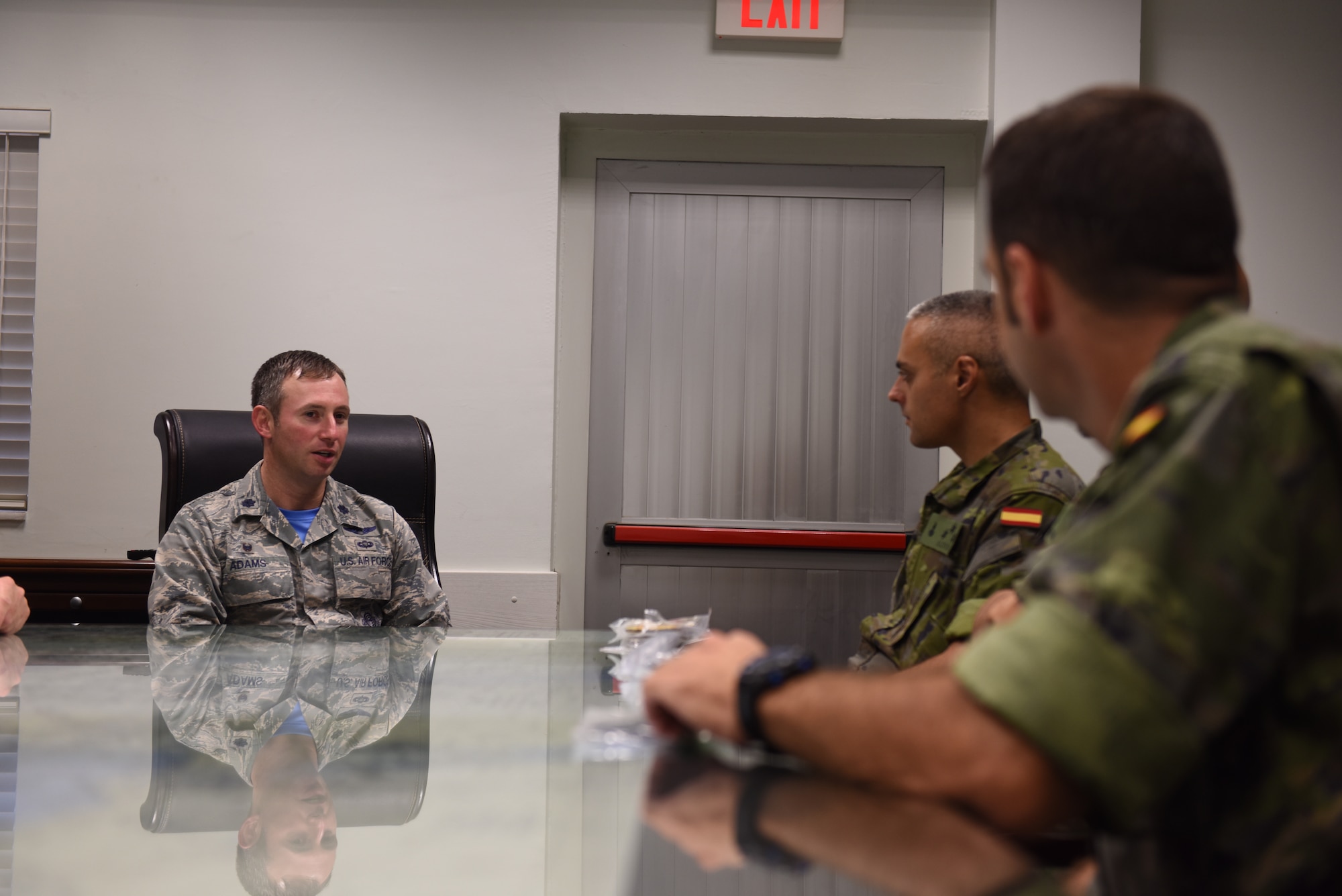 U.S. Air Force Lt. Col. Isaac Adams, 728th Air Mobility Squadron commander, briefs members of the Spanish Army on the unit’s mission at Incirlik Air Base, Turkey, Sept. 7, 2018.