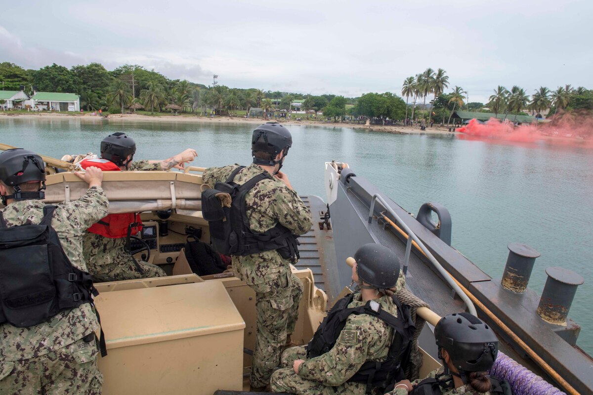 A landing craft utility prepares to land on the beach in Cartagena, Colombia for a humanitarian assistance training exercise