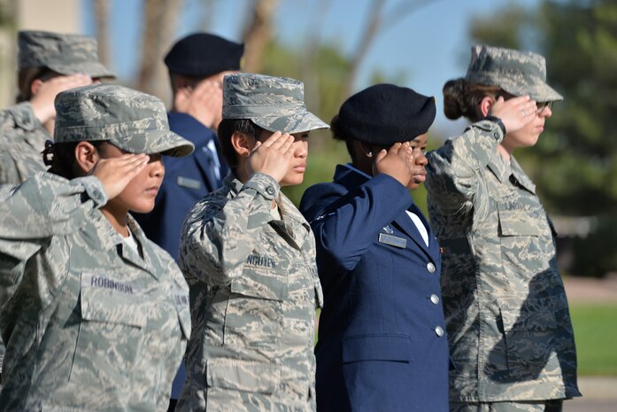 Nellis Airmen render a salute during a 9/11 remembrance ceremony at the U.S. Air Force Warfare Center flag pole, Nellis Air Force Base, Nevada, Sept. 11, 2018.  The Airmen paid special tribute to the victims and families of those lost in New York, Pennsylvania and in the Pentagon. (U.S. Air Force photo by Lorenz Crespo)