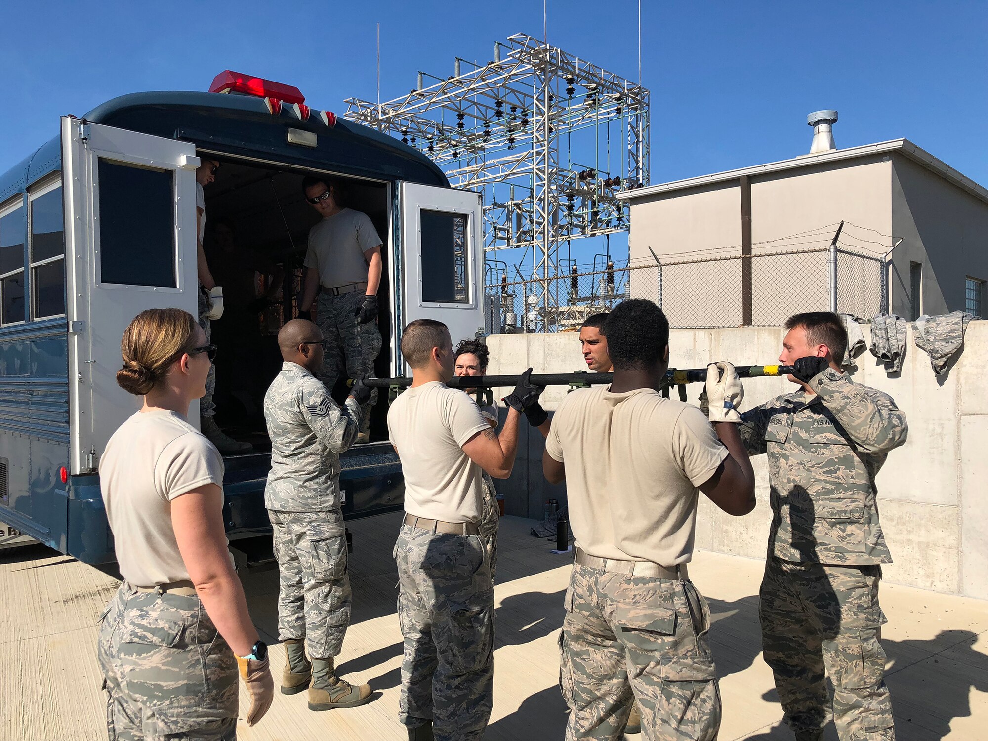445th Aeromedical Staging Squadron Airmen practice loading litters into an ambus during training conducted at the U.S. Air Force School of Aerospace Medicine as part of their two-week annual tour held in July 15-29, 2018.
