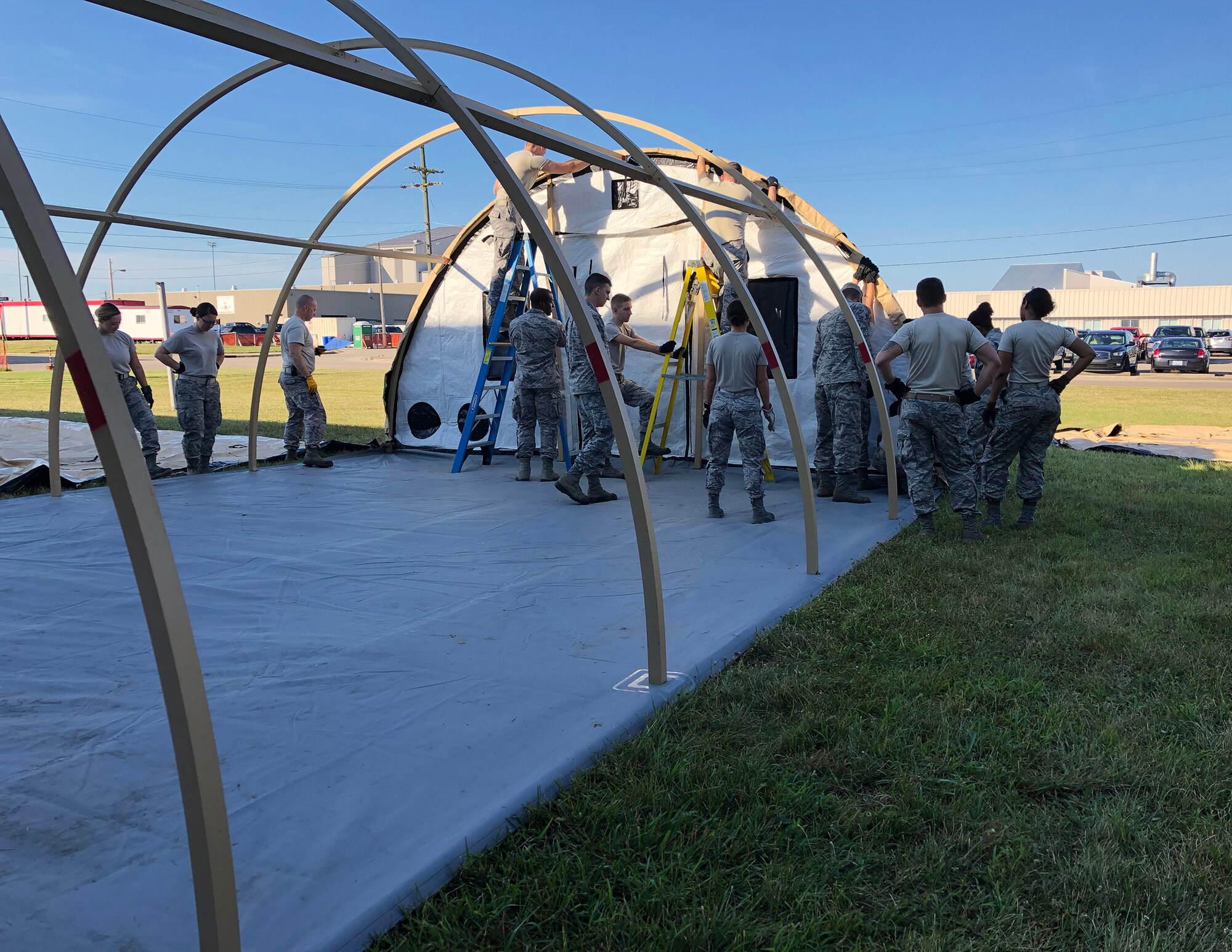 445th Aeromedical Staging Squadron Airmen set up an Alaskan Shelter En Route Patient Staging System during their annual tour July 25, 2018.
