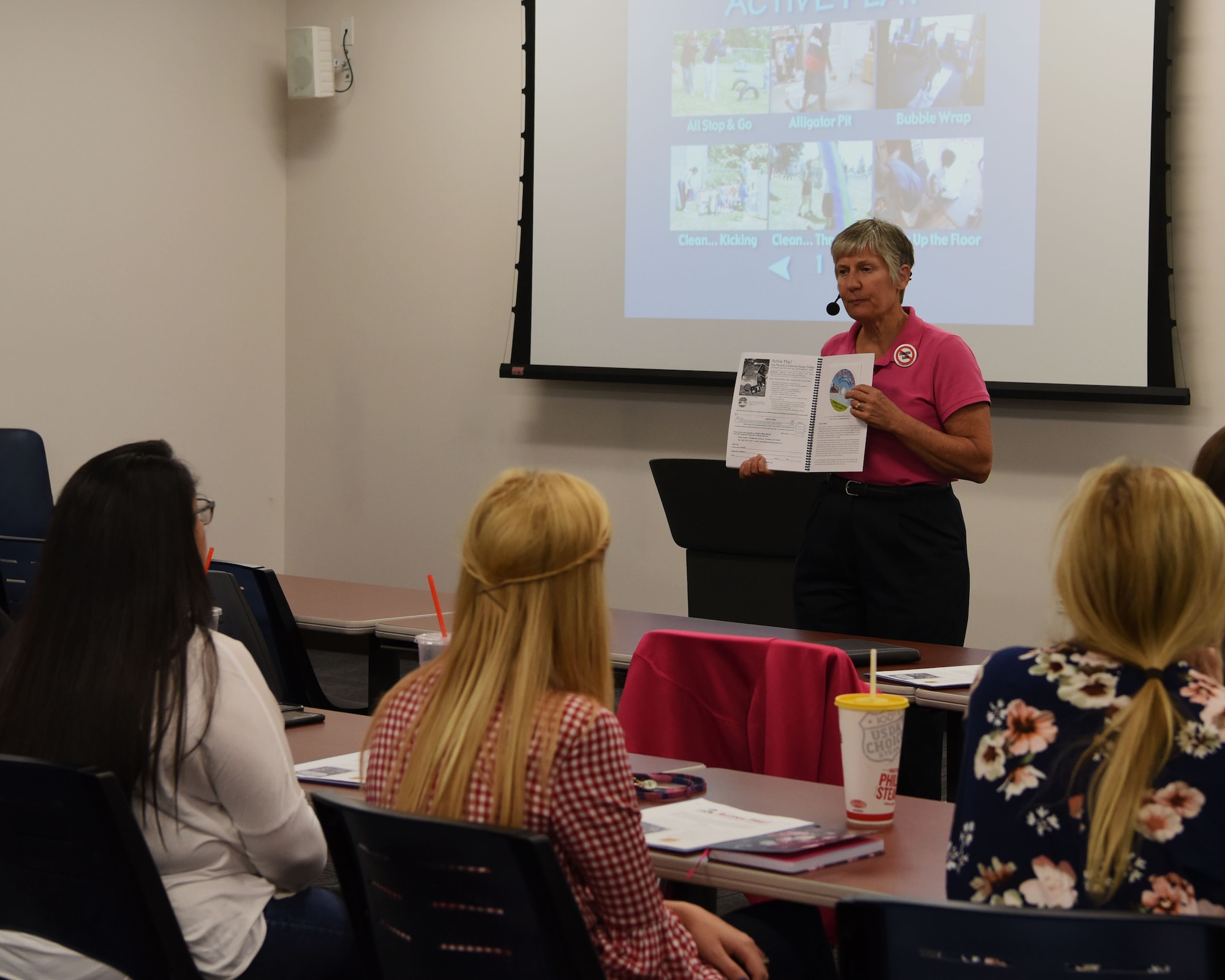 Dr. Diane H. Craft, a physical education professor, speaks about her book, ‘Active Play! Fun Physical Activities for Young Children’, during a seminar Sept. 5, 2018 at Luke Air Force Base, Ariz.