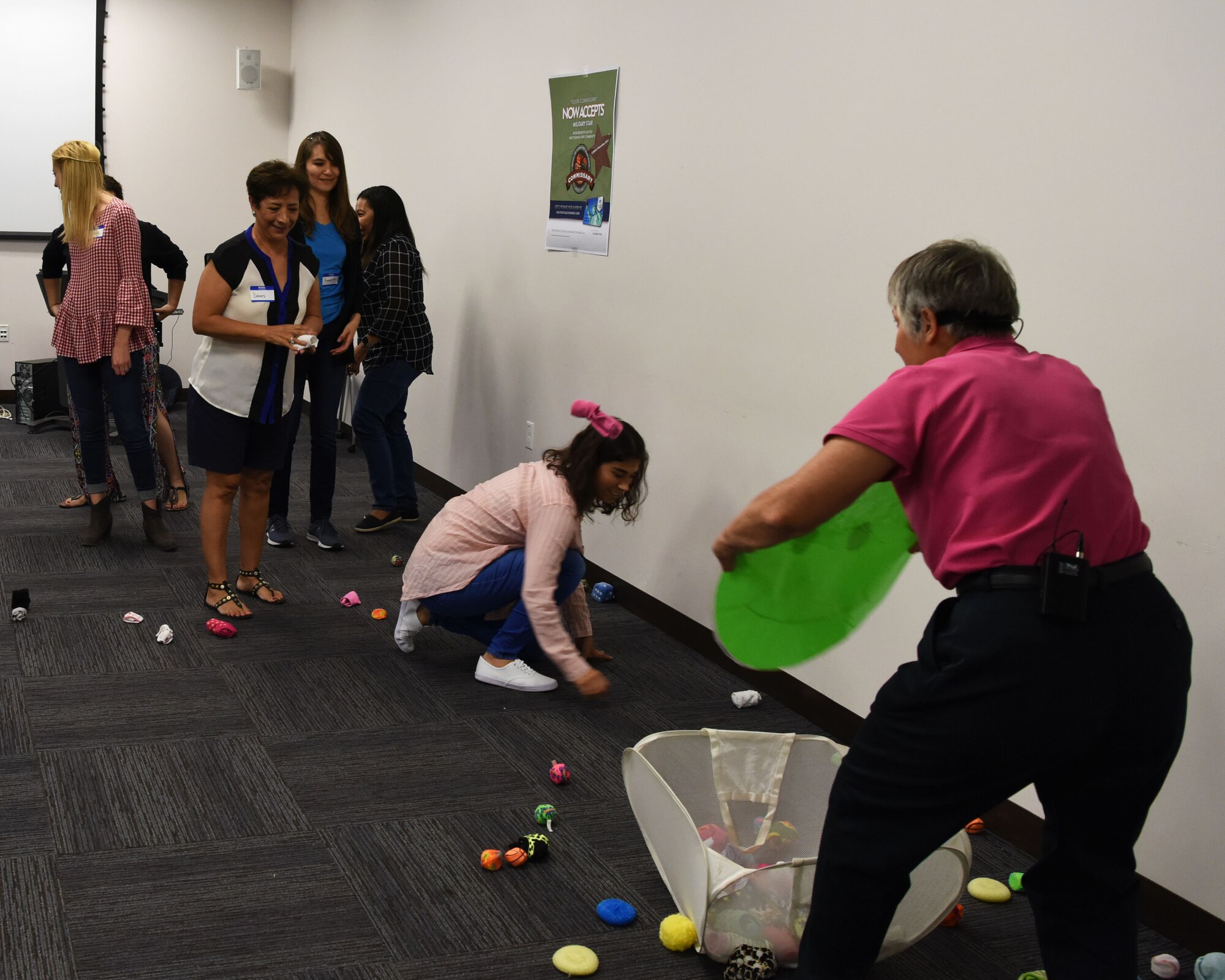Seminar attendees participate in a clean-up activity led by Dr. Diane H. Craft, a physical education professor, Sept. 5, 2018 at Luke Air Force Base, Ariz.