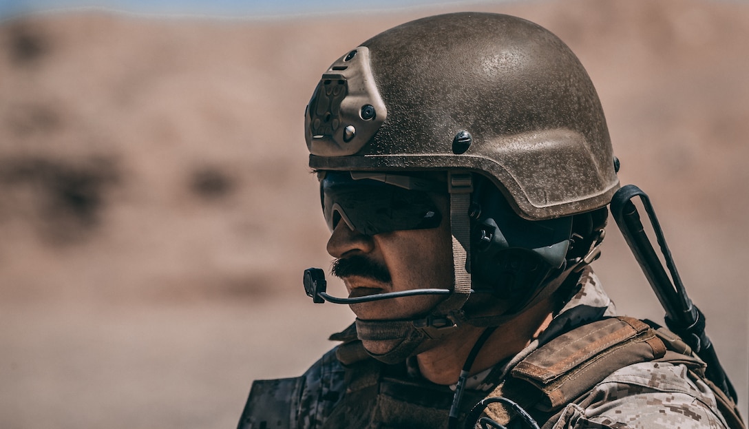 A U.S. Marines with 3rd Battalion, 4th Marines coordinates airstrikes during Valiant Mark 2018 at the Marine Corps Air Ground Combat Center, Twentynine Palms, Calif., Aug. 5, 2018. Valiant Mark is an annual exercise conducted by U.S. Marines and the Singapore Armed Forces designed to facilitate increased interoperability and strengthen military-to-military relationships through combined-arms integration skills training. (U.S. Marine Corps photo by Lance Cpl. William Chockey)