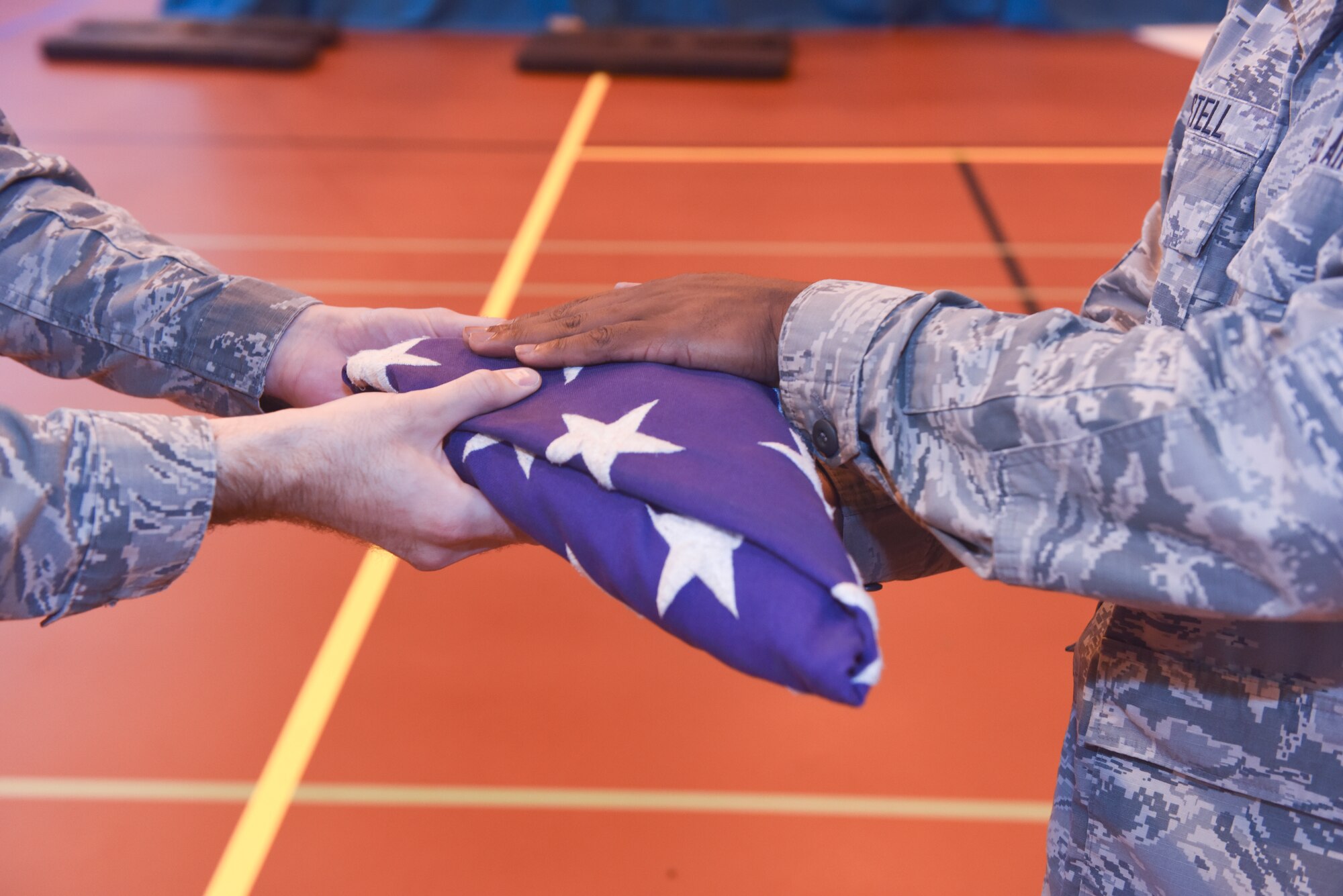 Members of the Team Mildenhall Honor Guard fold of an American flag during a practice at RAF Mildenhall, England Sept. 5, 2018. The ceremonial folding and presentation of the flag is a moving tribute of lasting importance to a veteran’s family. (U.S. Air Force photo by Airman 1st Class Brandon Esau)