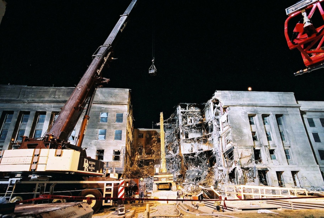 Work continues throughout the night at the site of the Pentagon terrorist attack Sept. 16, 2001..