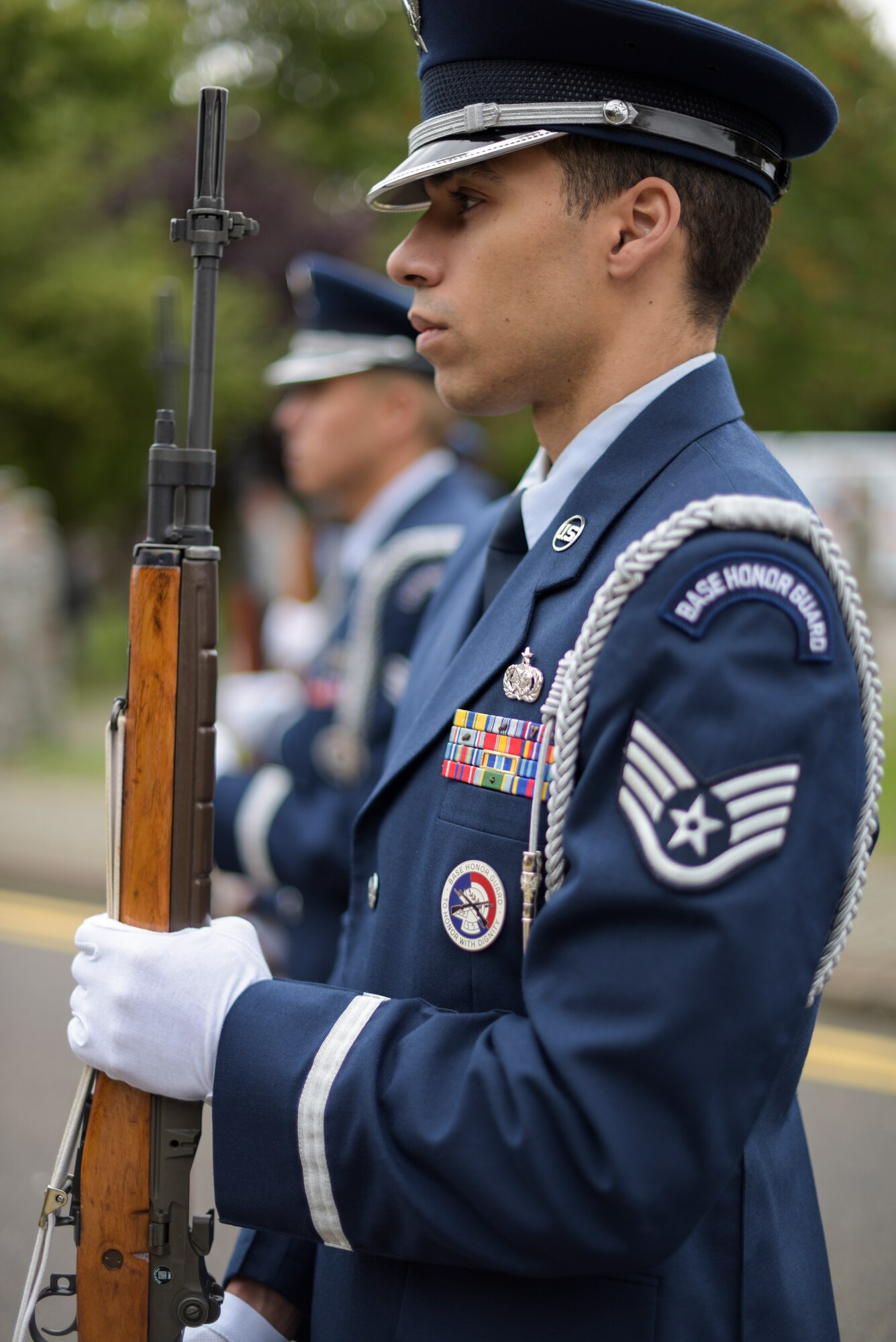 The Team Mildenhall Honor Guard stands by during a 9/11 ceremony at RAF Mildenhall Sep. 11, 2018. Though honor guard details are priority, Team Mildenhall honor guard members must remain current and progress in their career fields. (U.S. Air Force photo by Tech. Sgt. Emerson Nuñez)