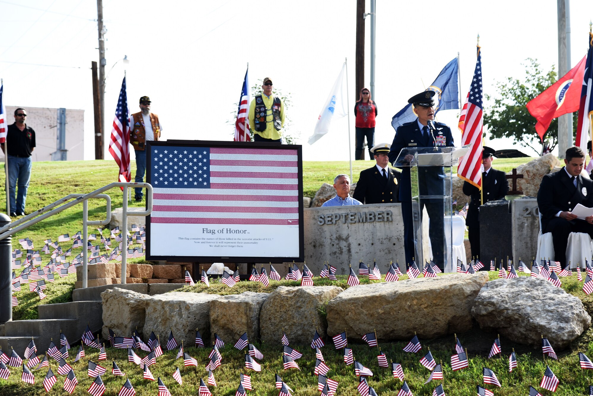 U.S. Air Force Col. Ricky Mills, 17th Training Wing commander, speaks during the 9/11 remembrance ceremony at the 9/11 memorial near the San Angelo Museum of Fine Arts in San Angelo, Texas, Sept. 11, 2018. During his speech, Mills shared about how service members were affected by the attacks. (U.S. Air Force photo by Staff Sgt. Joshua Edwards/Released)