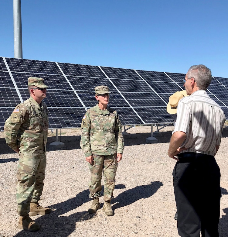 COCHITI DAM, N.M. -- (l-r): District commander Lt. Col. Larry Caswell, South Pacific Division commander Col. (P) Kimberly Colloton, and Operations Division chief Mark Yuska tour the Cochiti Photovoltaic Project at Cochiti Lake, Aug. 28, 2018.