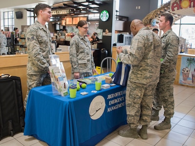 Senior Airmen Paul Seaman and Amber Edgell, both 773d Civil Engineer Squadron emergency management journeymen, speak to community members about emergency kits and being prepared during National Preparedness Month at Joint Base Elmendorf-Richardson, Alaska, Sept. 7, 2018. Throughout the month of September the emergency management flight is scheduled to provide information to the JBER community at the Base Exchange (in front of Game Stop) on Fridays from 11:30 a.m. to 1:30 p.m.