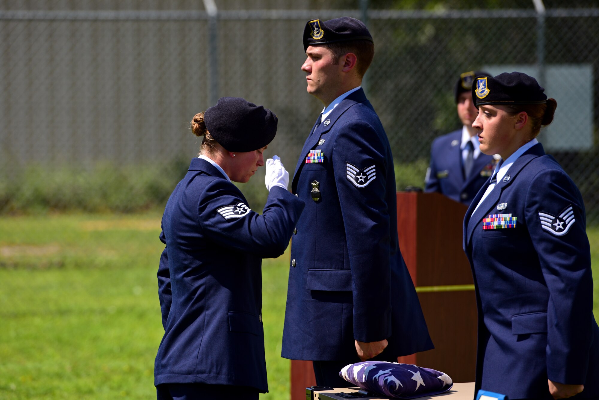 U.S. Air Force Staff Sgt. Katelyn Grau, 325th Security Forces Squadron member, renders a final salute to military working dog (MWD) Jack during his memorial service at Tyndall air Force Base, Fla., Sept. 7, 2018. Jack was an explosives and patrol dog who shared a special bond with his handlers. MWDs enhance Security Forces capabilities to protect resources, enforce military laws, suppress drugs, detect explosives and protect installations. (U.S. Air Force photo by Senior Airman Isaiah J. Soliz)