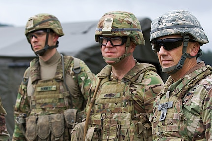 State Command Sgt. Maj. James R. Gordon and 76th Brigade Command Sgt. Maj. Steven J. Bishop observe their soldiers during live-fire exercises for Orient Shield 2018. The U.S. Army and Japan Ground Self Defense Force take meticulous range safety precautions to ensure live-fire training is safe as the training area supports firing these weapons systems.