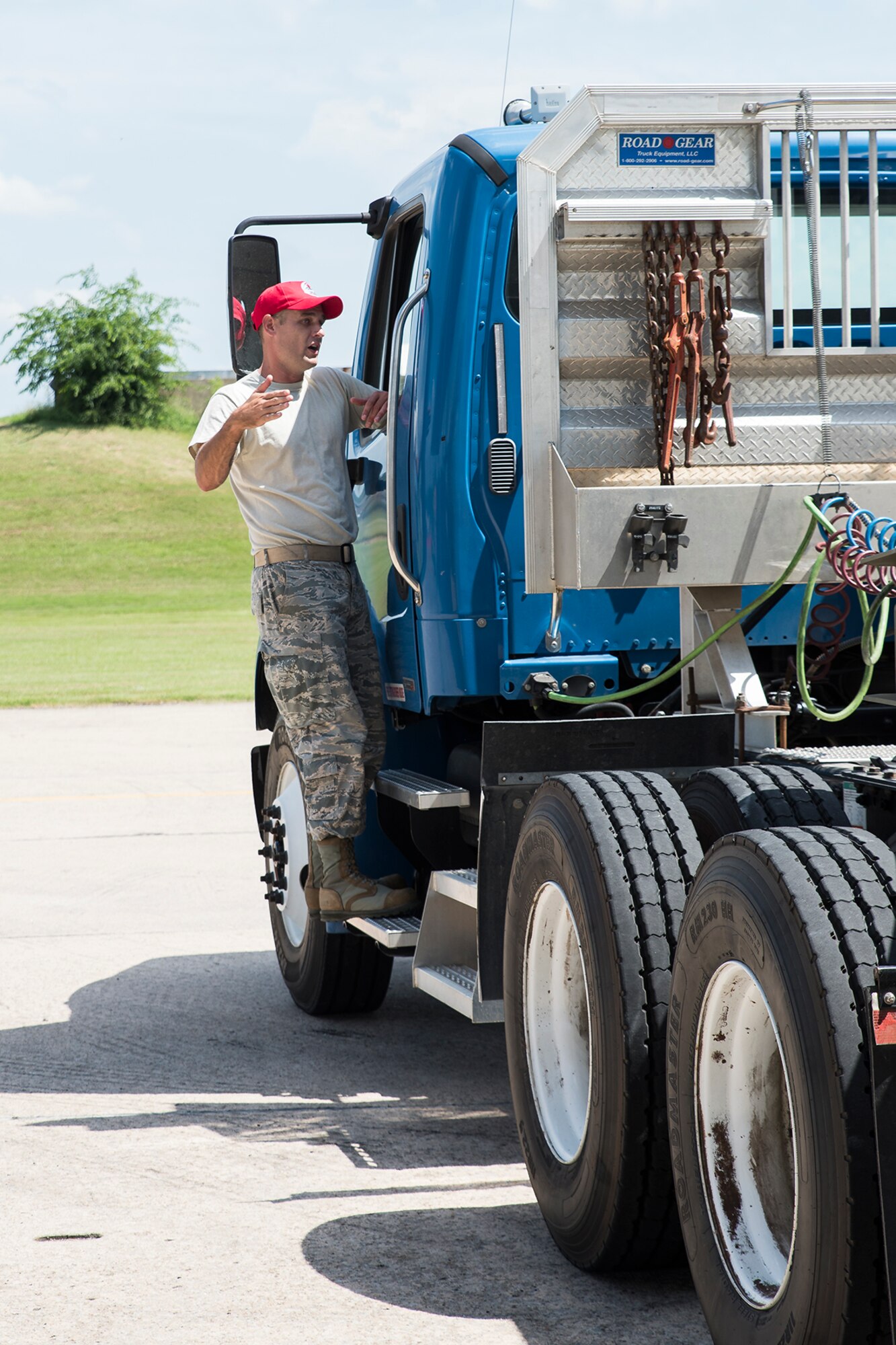 Master Sgt. Bryan Sutton, 188th RED HORSE instructor, offers pointers to a student practicing backing maneuvers on the 3T course at Ebbing ANG Base, Ark., August 29, 2018. The 3T course teaches active, Guard and Reserve Airmen, as well as DOD civilian employees the skills needed to operate tractor-trailers effectively and be able to acquire a military or civilian commercial driver's license. (U.S. Air National Guard photo/Tech. Sgt. John E. Hillier)