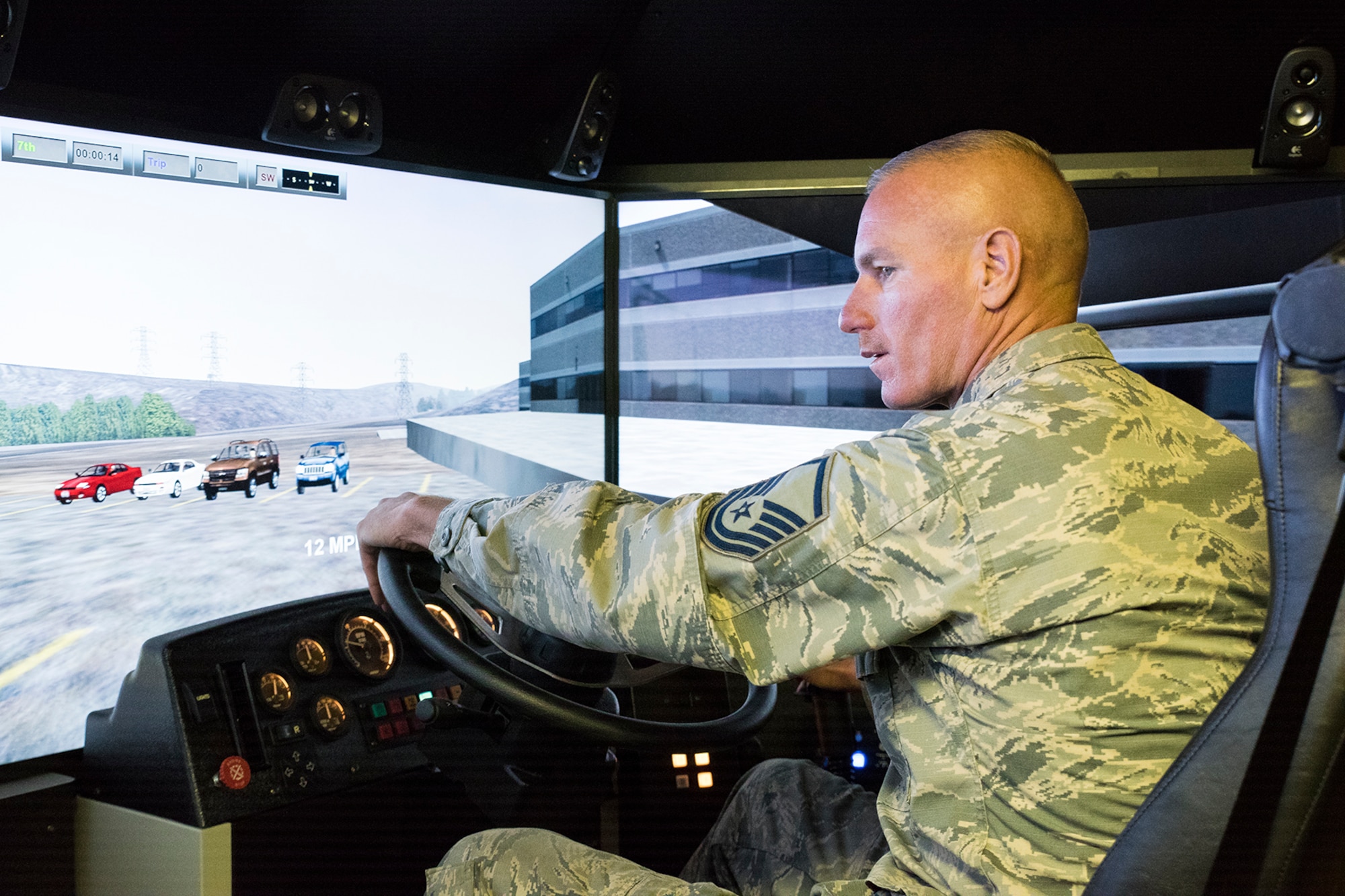 Master Sgt. Bryan Sutton, 188th RED HORSE instructor, demonstrates the 3T course's tractor-trailer simulator at Ebbing ANG Base, Ark., August 30, 2018. The 3T course teaches active, Guard and Reserve Airmen, as well as DOD civilian employees the skills needed to operate tractor-trailers effectively and be able to acquire a military or civilian commercial driver's license. (U.S. Air National Guard photo/Tech. Sgt. John E. Hillier)