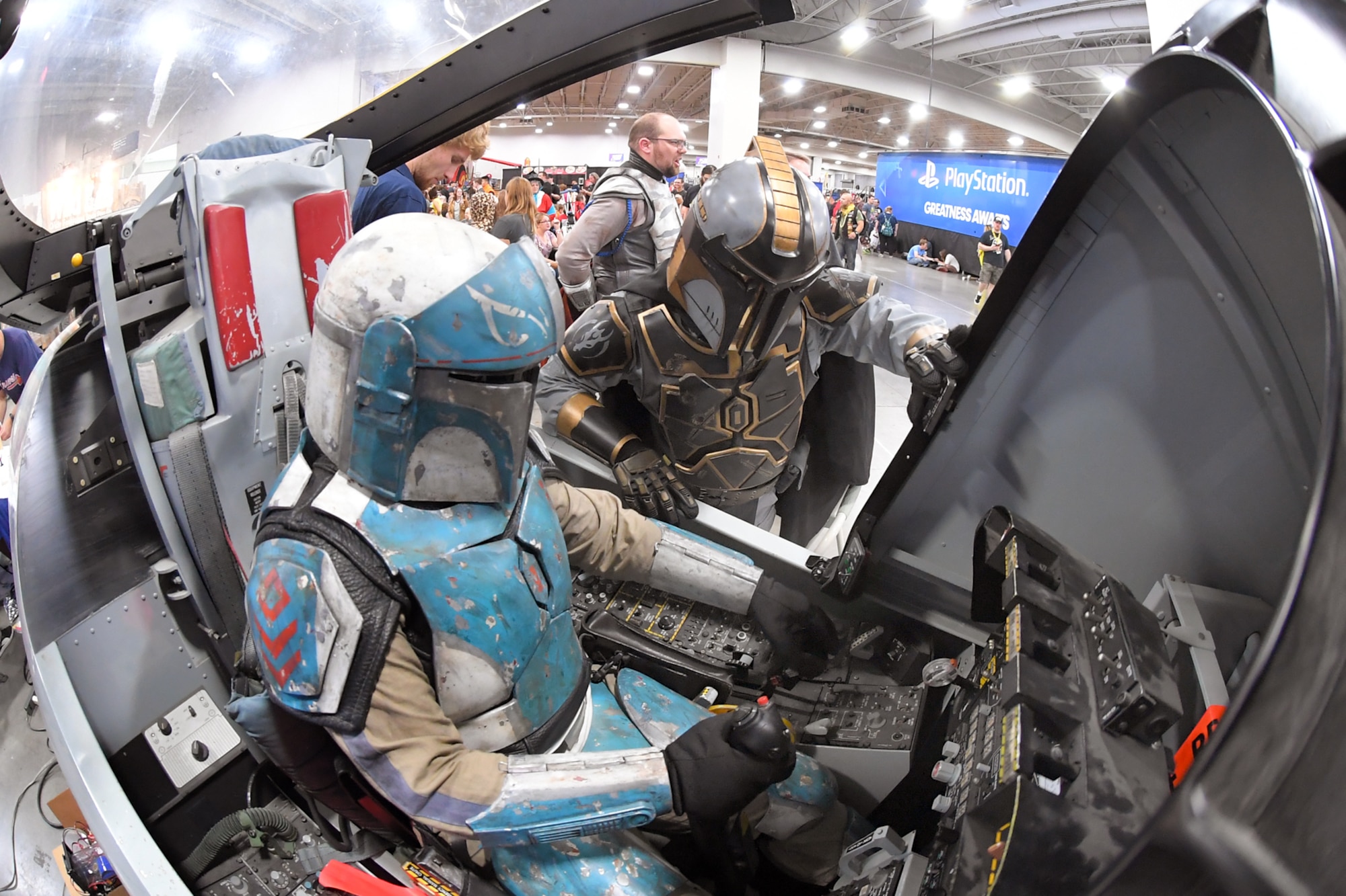 FanX visitors dressed as Star Wars characters try out the A-10 cockpit flight simulator at the Hill Air Force Base STEM Outreach booth, Sept. 7, 2018, Salt Lake City.