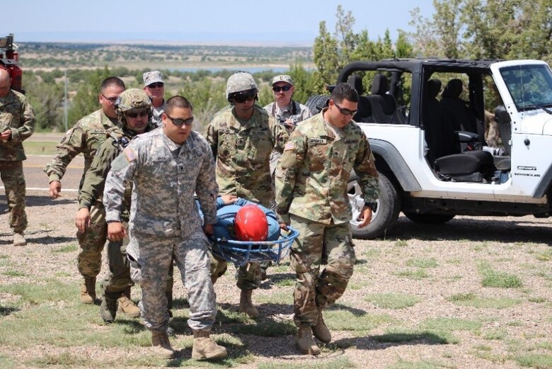 SANTA ROSA LAKE, N.M. -- Members of the U.S. Air Force Auxiliary Civil Air Patrol and the New Mexico Civil Air Patrol transport one of the “lost” hikers "rescued" during training exercise Operation Pave Hawk, Aug. 4, 2018.