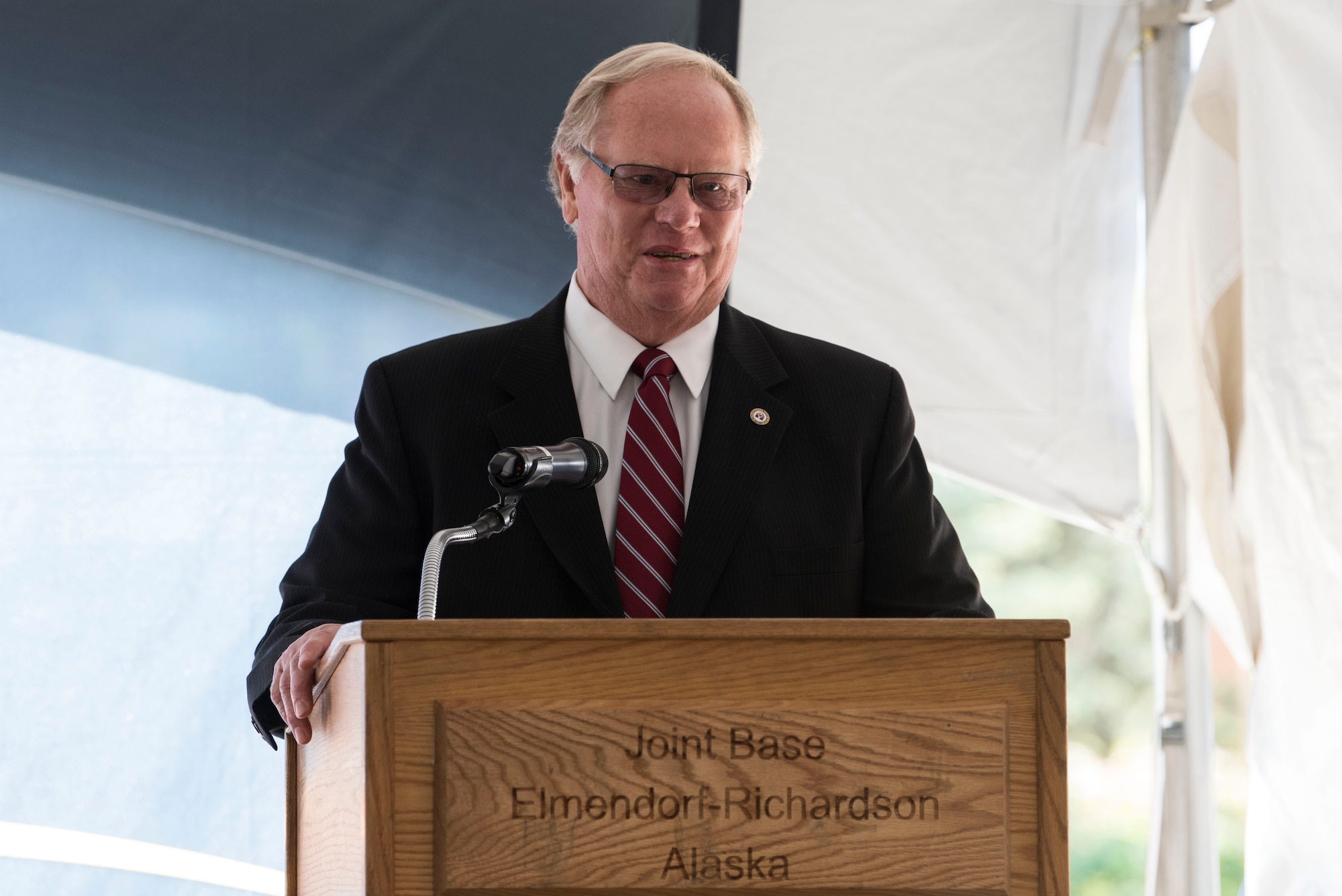 Terry Parks, Friends of Fisher House president, speaks during the opening ceremony for Fisher House II at Joint Base Elmendorf-Richardson, Alaska, Sep. 10, 2018. The opening ceremony featured an array of key speakers, the 9th Army Band, Air Force Honor Guard, a ribbon-cutting and a walk-through. The Fisher House program is a unique private-public partnership established to improve the quality of life for military members, retirees, veterans and their families.