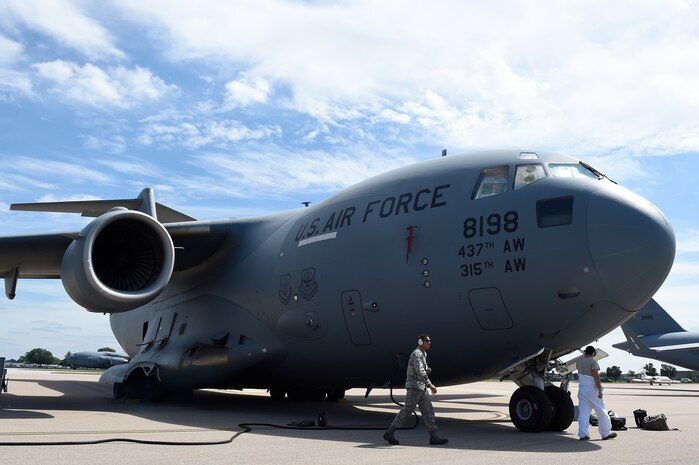 Airmen assigned to the 437th Aircraft Maintenance Squadron conduct post-flight inspections on a Globemaster III C-17 Sept. 12, 2018, at Scott Air Force Base, Ill.