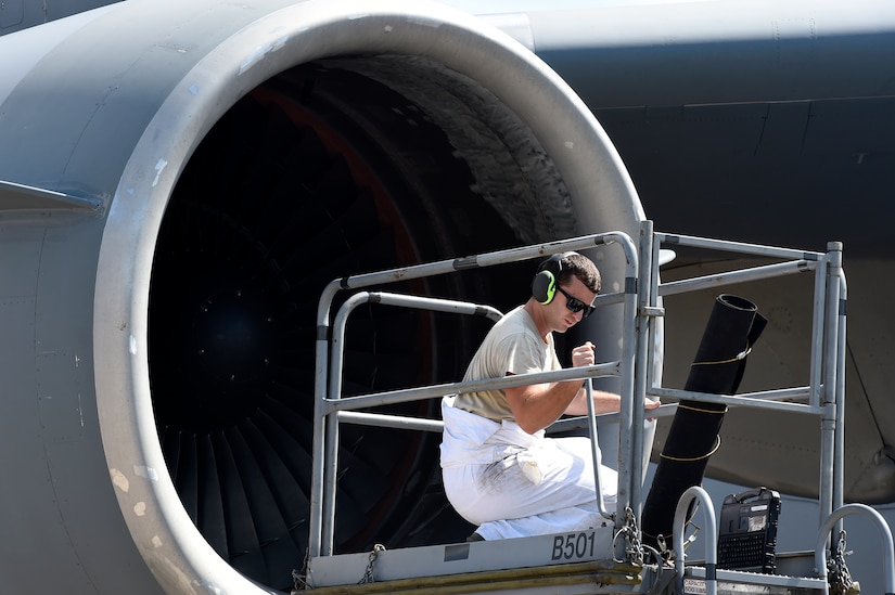 Airman 1st Class Richard Cordell, a 437th Aircraft Maintenance Squadron aerospace propulsion specialist, raises a lift before performing post-flight inspections on a C-17 Globemaster III engine Sept. 12, 2018, at Scott Air Force Base, Ill.