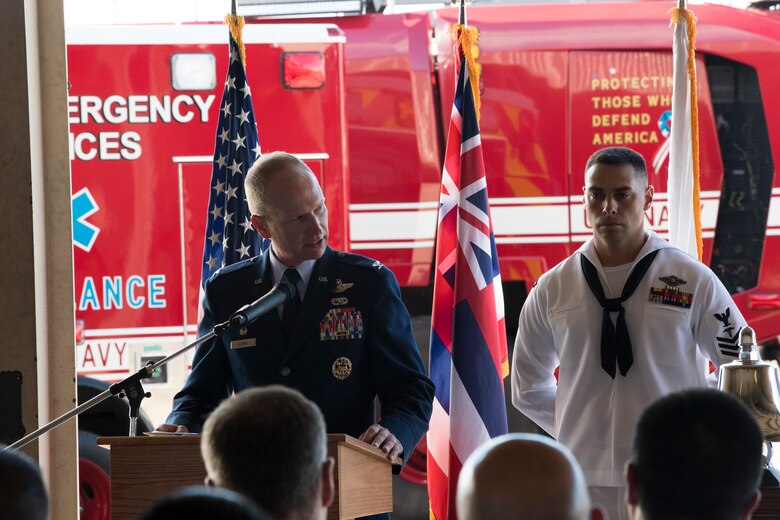 U.S. Air Force Col. Halsey Burks, 15th Wing commander, looks over to a formation of first responders recognizing them for their service during a 9/11 Remembrance Ceremony at the Hickam Field Fire Department at Joint Base Pearl Harbor-Hickam, Hawaii, Sept. 11, 2018. The ceremony honored the heroic actions of first responders who answered the nation’s call that fateful day and recognized men and women who currently serve. (U.S. Air Force photo by Master Sgt. Theanne Herrmann)