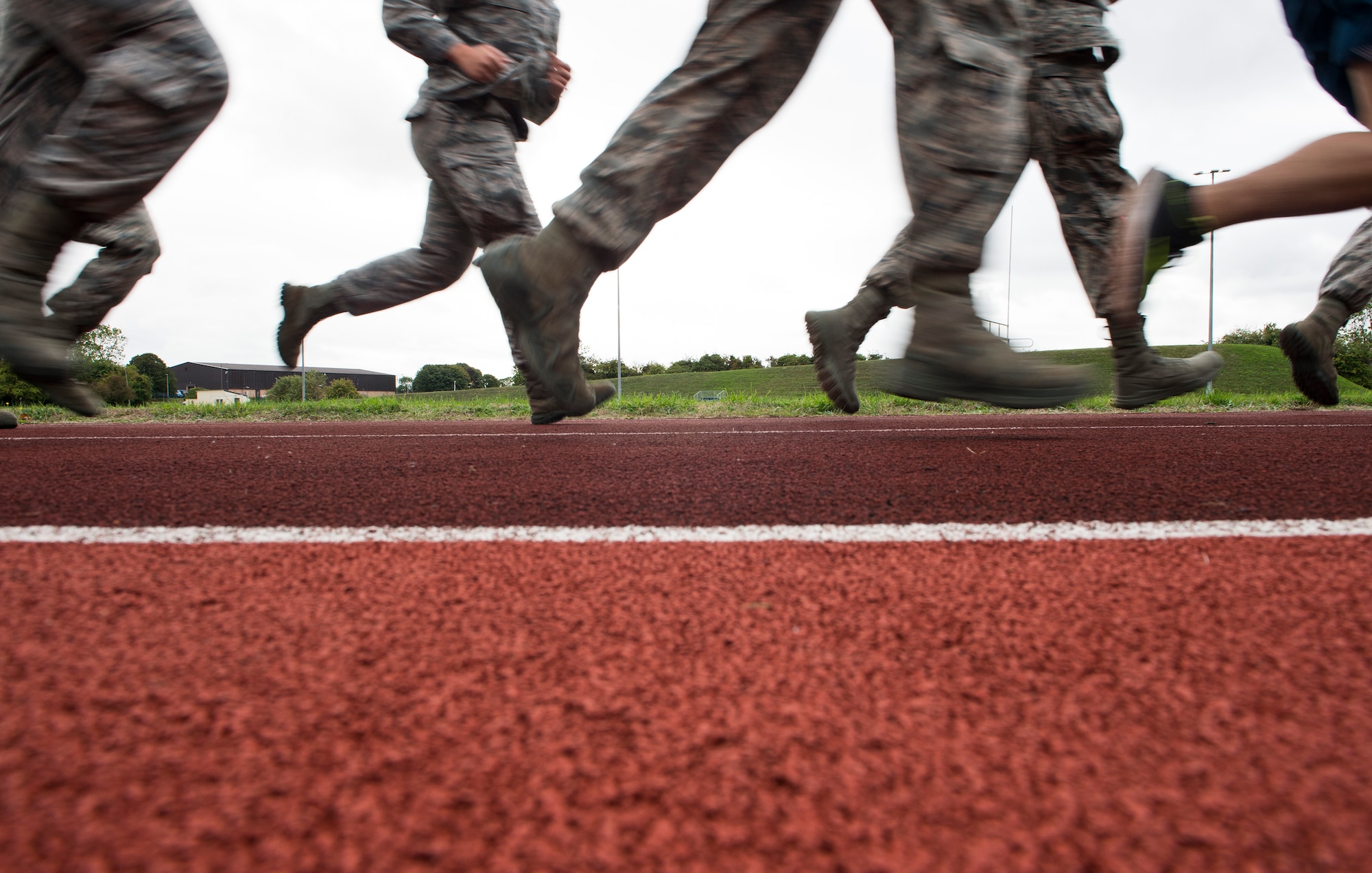 Airmen from the 423rd Security Forces Squadron run in honor of the fallen at RAF Croughton, United Kingdom, Sept. 11, 2018. The U.S. flag was held throughout the run and never stopped moving. (U.S. Air Force photo by Senior Airman Chase Sousa)