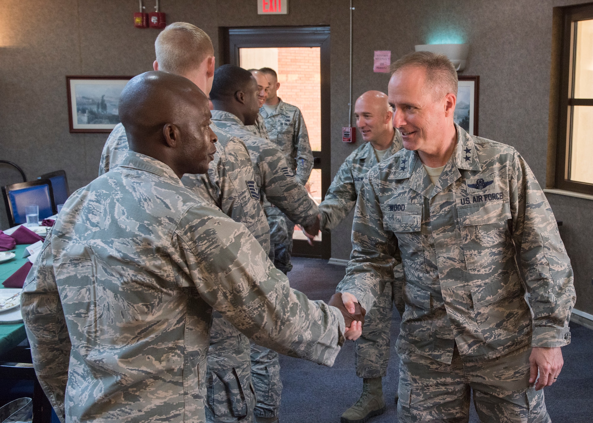 U.S. Air Force Major Gen. John Wood, 3rd Air Force commander, shakes hands with USAF Chaplain (Capt.) John Appiah at Incirlik Air Base, Turkey, Sept. 12, 2018.